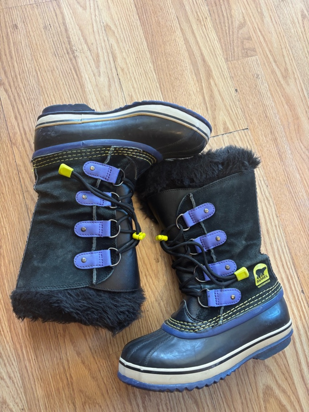 Sorel Kids Black and Purple Winter Boots with Yellow Accents